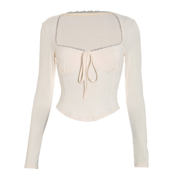 Long sleeve self tie lace hem top