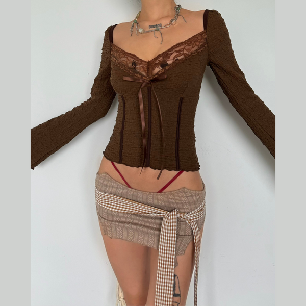 Long sleeve textured bowknot lace hem top