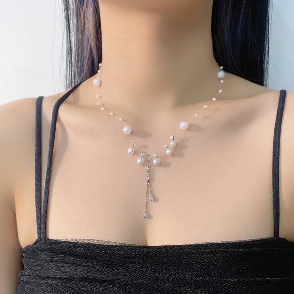Beaded faux pearl tassels necklace