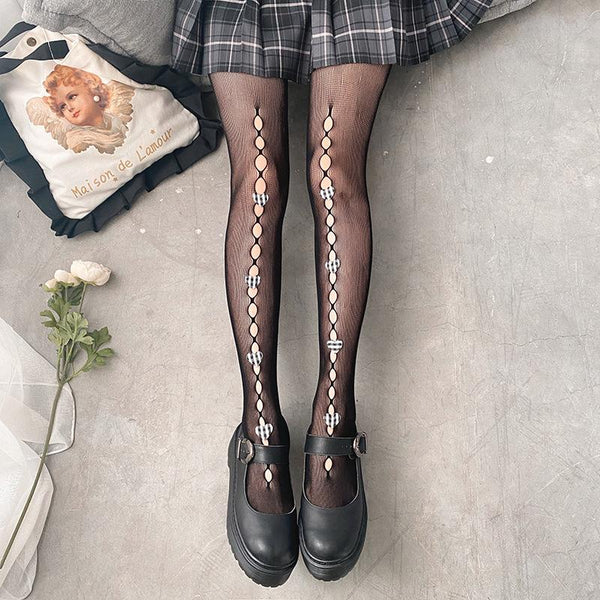 Hollow out fishnet heart applique tights